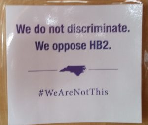 "We do not discriminate. We oppose HB2" sign